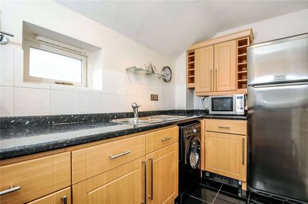 A top floor two bedroom flat just off Eton High Street with one allocated parking space. - Photo 5