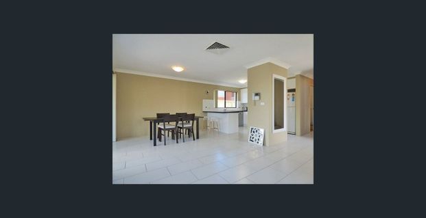 Home by the Beach - Photo 1