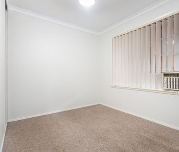 AFFORDABLE & CONVENIENTLY LOCATED - Photo 2