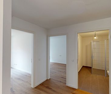 Modernes Wohnkonzept: 3-Zimmer-Erdgeschosswohnung mit EBK und Terrasse - Photo 1