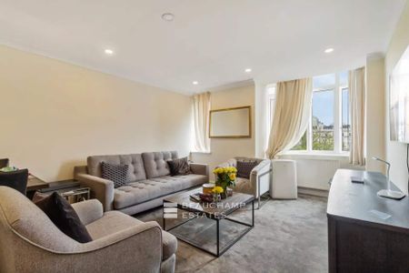 An upper floor apartment with porter, located on Sloane Street. - Photo 3