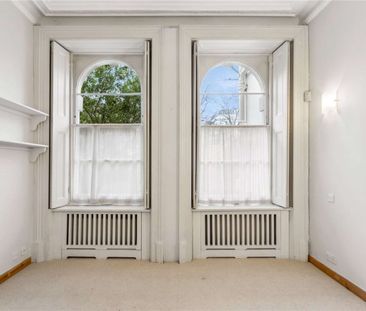 A beautiful raised ground floor one bedroom flat with direct access... - Photo 1