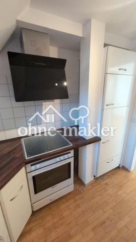 Sonnige 3-Zimmer DG-Wohnung mit tollem Blick auf die Berge mit EBK und Gartennutzung! - Photo 2