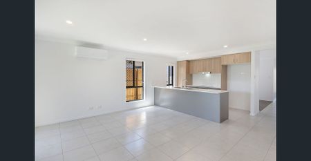 A modern sanctuary in a peaceful, family-friendly pocket, this beautifully finished 4-bedroom home delivers effortless living with a touch of luxury. - Photo 2