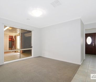 4-Bedroom Family Home with Outdoor Entertaining & Shed - Photo 5