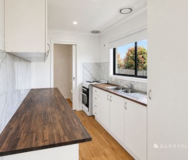 Comfortable Living with Ensuite, Spacious Outdoor Entertaining & Ga... - Photo 3