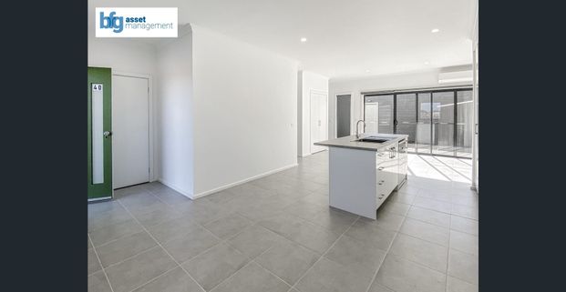 Modern 3-Bedroom Townhouse in a Prime Location! - Photo 1