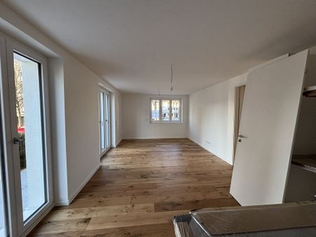 Helle 3-Zimmer-Neubauwohnung mit Terrasse, moderner Einbauküche & Pkw-Stellplatz - Foto 2