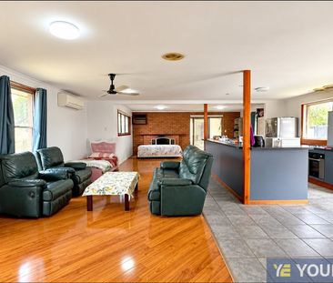 Spacious Family Home with Triple Garage and Large Shed! - Photo 1