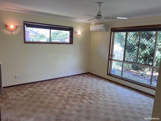 NEAT AND TIDY 3 BEDROOM HOME IN URANGAN! (BREAK LEASE - INC: $570 1/3/26) - Photo 1