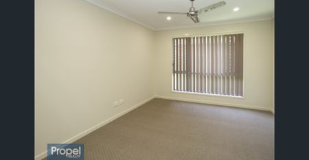 Modern 4 bedroom home in Riverbank estate - Photo 4