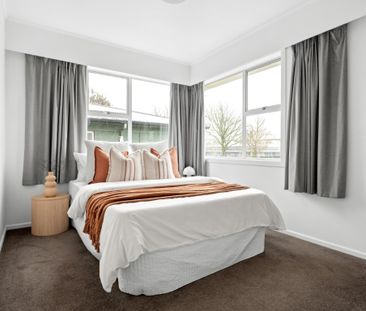 Step inside this three-bedroom home, where comfort meets convenience. - Photo 2