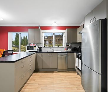 Modern and low-maintenance, this 3-bedroom, 1-bathroom home with a ... - Photo 1