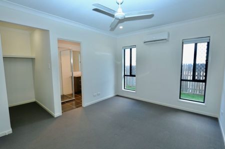 Modern Four Bedroom Springfield Lakes Family Home - Photo 5