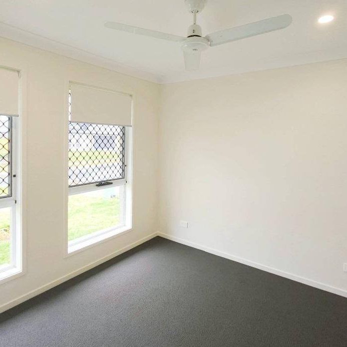 Modern Family Home in Plainland Crossing Estate - Photo 1