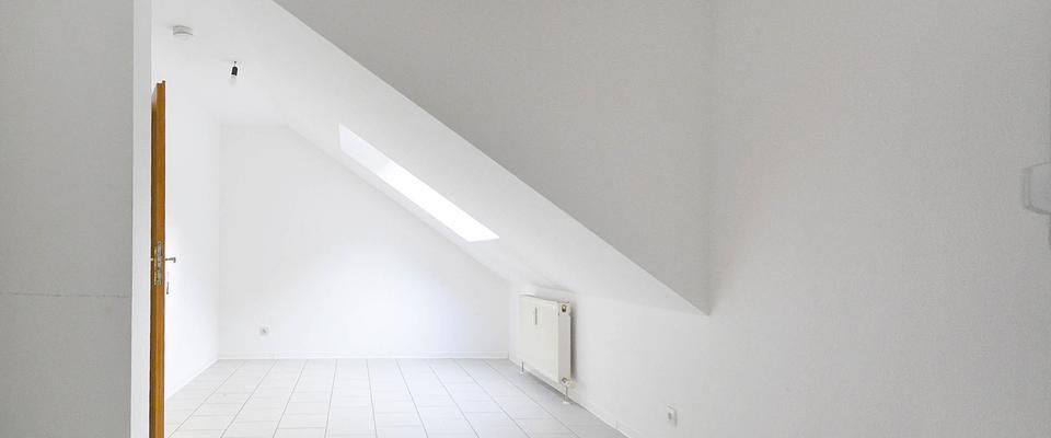 Attraktive 3-Zimmer-Dachgeschosswohnung in idyllischer Lage - Foto 1