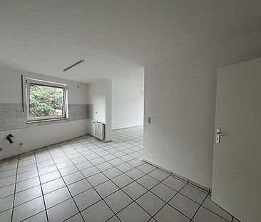 Helle Dachgeschosswohnung mit Balkon, ca. 62,41 m² in Dortmund-Mart... - Foto 1