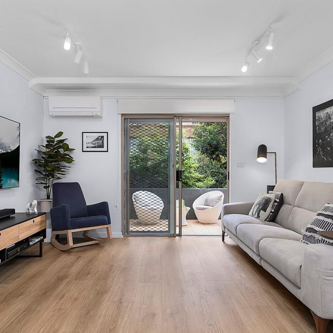 Modern North-Facing Apartment in Prime Location - Photo 1