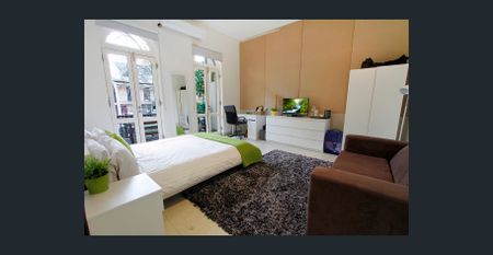 Fully Furnished Spacious Room with AirconHigh Ceiling & Balcony! All bills and internet are included - Photo 2