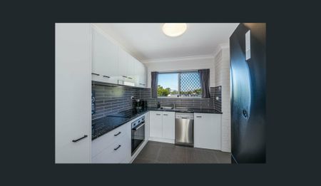 TOP FLOOR RENOVATED UNIT IN BONGAREE - Photo 4