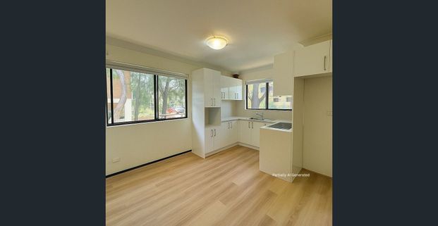 NEWLY RENOVATED - Spacious & Updated 2-Bedroom Unit in the Heart of Carlton - Photo 1