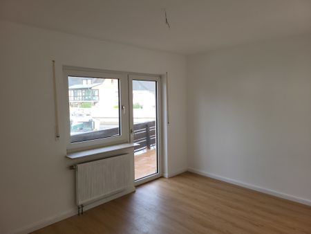 Renovierte 3 Zimmerwohnung mit schicker Einbauküche in zentraler Lage in Welschneudorf! - Foto 4