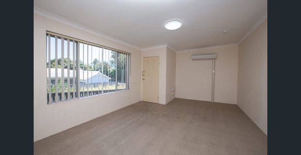 Two Bedroom Unit with Air Conditioner & Garage - Photo 1