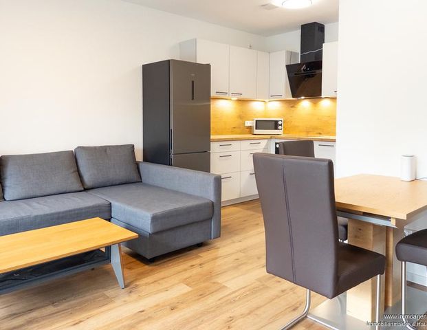 Kleine Neubauwohnung mit Blick ins Grüne - Foto 1