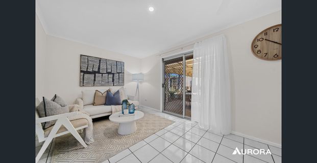 Entertain in Style – Spacious Family Home with a Huge Yard! - Photo 1