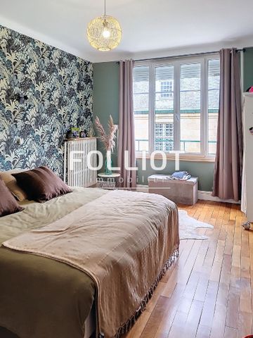 A LOUER - CENTRE VILLE DE VIRE - BEAU ET GRAND F3 DE 93 M� - Photo 3