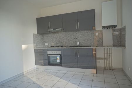 Location Appartement 5 pièces 89m² - Photo 4