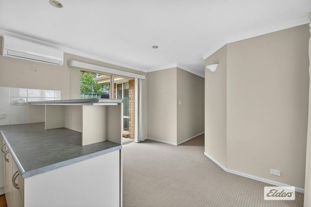 Effortless Living in Prime Location - Photo 1