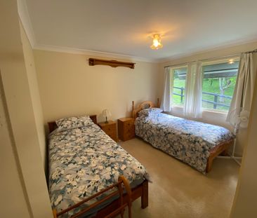 Spacious two bedroom house on acreage with electricity included - Photo 6