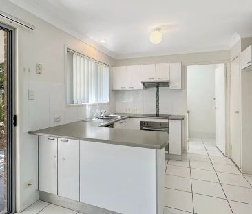 “Available Now! Modern Townhouse with Great Amenities” - Photo 1