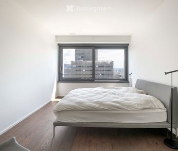 Moderne 3.5-Zimmer-Wohnung im 12. Stock mit atemberaubendem Stadtblick - Photo 4