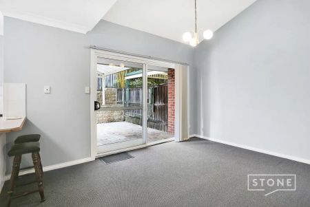 “Updated townhouse in convenient setting” - Photo 2