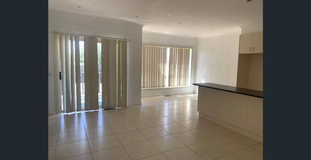 Stylish & Spacious Two-Bedroom Townhouse with Study and Garage - Photo 1