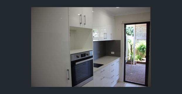 Beautifully Renovated Bijou in The Palms - Photo 1