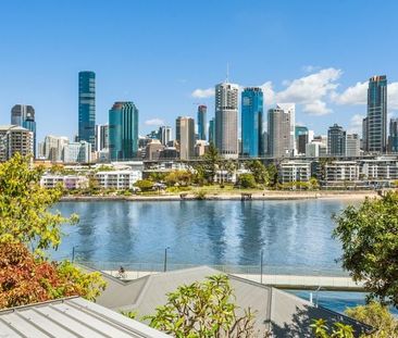 Furnished Riverside Apartment with City Views *Water Bills Included - Photo 1