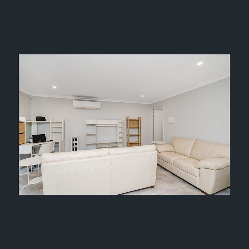 Stylish, Fully Furnished Ground-Floor Apartment in the Heart of Belmont! - Photo 1