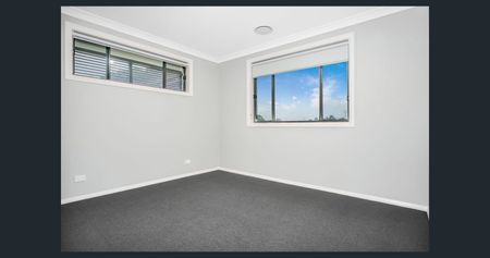 Stunning 4-Bedroom Family Home in Oxley Park - Photo 2