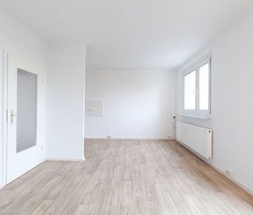 Tolle 3 Zimmer-Wohnung mit schönem Ausblick in Halle - für Sie saniert - Photo 2