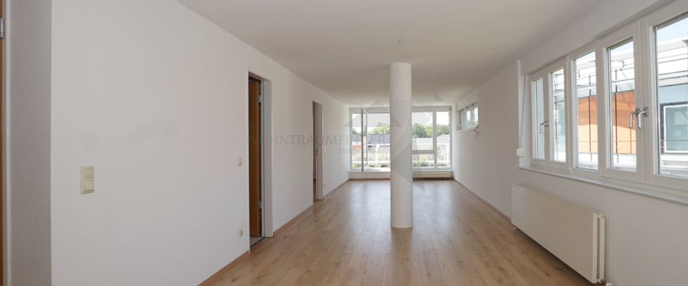 2-Raum-Wohnung mit viel Platz, Dachterrasse und TG-Stellplatz nahe der Innenstadt - Photo 1