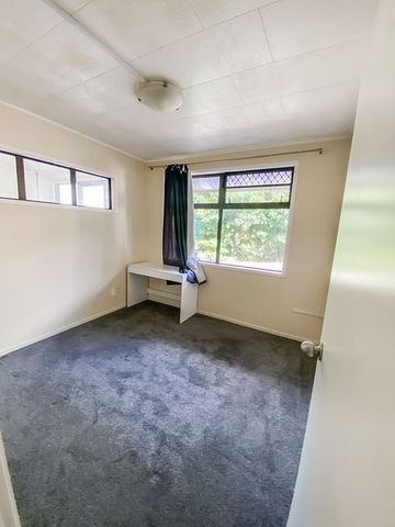 Charming Two-Bedroom Unit with Rumpus Room & Deck - Photo 5