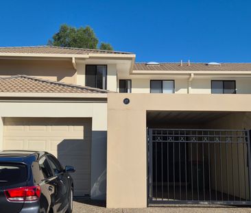 RENOVATED THREE BEDROOM TOWNHOUSE IN GATED COMPLEX WITH POOL LOCATE... - Photo 2