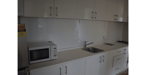 Secure 2-Bedroom Apartment with Cafes, Shops & Transport at Your Doorstep - Photo 1