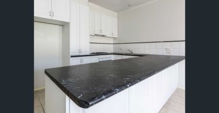 THREE BEDROOM, TWO BATHROOM, TWO LIVING IN A GREAT CENTRAL LOCATION - Photo 2