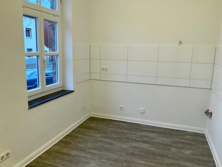 Kleines Reihenmittelhaus mit Altbaucharme - Photo 2