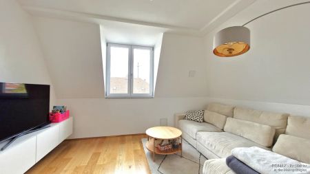 Außergewöhnliche Maisonette Wohnung mit Dachterrasse - Foto 2