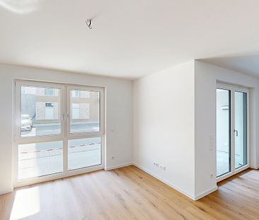 Modernes Wohnkonzept: 3-Zimmer-Erdgeschosswohnung mit EBK und Terrasse - Foto 3